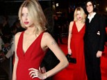Debuting the little baby bump! Peaches Geldof shows off her pregnant shape as she and husband enjoy rare date night at Breaking Dawn premiere 