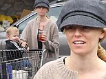 Mom on the run: Hunger Games actress Elizabeth Banks, who announced the birth of her second child this week, picked up supplies from her local Whole Foods in LA with her son Felix 