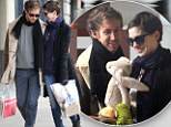 Getting some practice in? Anne Hathaway and new husband Adam Shulman are all smiles as they shop for children's toys