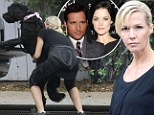 Puppy love: Jennie Garth headed off for a spot of exercise with her dog Black Pearl in LA on Friday 