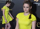 Mellow Yellow: Kristen Stewart shows off her best pout as she steps out in a bold dress at Madrid Twilight premiere
