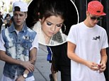 Walk of shame? Justin Bieber changes from one garish outfit to another after 'spending the night with Selena Gomez' 