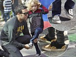 Like father, like son! Punk rocker Pete Wentz and son Bronx sport cool kicks on a day out at the farmers market