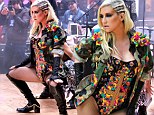 Isn't it a bit early for that? Ke$ha gyrates on stage in high-cut leotard and fishnets on morning TV show 
