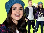 No Bieber! But Selena Gomez makes do with Justin lookalike at photo call for adidas spin-off brand 