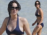 She's a water babe! Jennifer Lawrence cools off in the surf as she enjoys a day at the beach in Maui