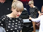 Doggone! Taylor Swift dashes to her car wearing a cute retro-style T-shirt adorned with puppies as she prepares for Sydney performance