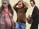 Gaunt Matthew McConaughey gets a cheery visit on set from pregnant wife Camila and cute daughter Vida 