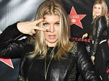 Leather lady: Fergie rocks motorcycle jacket at 'upscale' Walgreens megastore opening in Hollywood