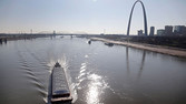 A barge powers its way up the Mississippi River Friday, Nov. 16, 2012