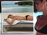 'Thank you for another beautiful day!': Heidi Klum tweeted this picture while holidaying at in a secret destination