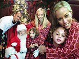 'C'mon ride the train!' Kendra Wilkinson takes her son to meet Santa in style... in their PJs