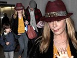'Home sweet home!' LeAnn Rimes arrives back to Los Angeles with Eddie Cibrian and his boys 