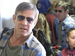 Vegas actor Dennis Quaid and a mystery woman departing on a flight at LAX airport