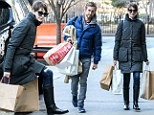 She still loves a bargain! Millionaire Anne Hathaway shops up a storm in the sale with husband Adam Shulman 