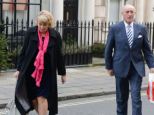 Third time lucky! Len Goodman and Sue Barrett arrive for their surprise wedding at Mosimann's in London