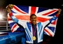 Gold medallist Anthony Joshua of Great Britain celebrates