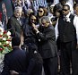 Sherra Wright, the ex-wife of slain NBA basketball player Lorenzen Wright, grieves at the casket of Wright during a memorial service at the FedExForum in Memphis, Tennessee, in August 2010