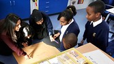 Children from year 6 at Brookside Primary School in Hayes, have a lesson in finance using money and games such as Monopoly