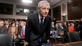 Chuck Hagel sits down before giving testimony to the Senate Armed Services Committee