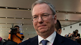 Eric Schmidt, Google chairman, talks to the media at an airport Beijing after arriving from North Korea