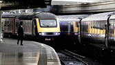 A high speed train arrives at on platform one at Paddington Station, London