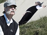 Talk about bad form! Bill Murray collapses in the sand after playing woeful shot at Pebble Beach pro-am golf tournament