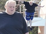 Wonder how big a Splash he's going to make! Rotund comedian Louie Anderson takes a leap of faith as he rehearses for ABC's celebrity diving show