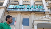 A view of the front entrance of AGD- Asia Green Development bank in downtown Yangon. As it strives to become Asia's next economic star Myanmar has set its sights on overhauling its battered and distrusted banking system, a move which could pave the way for foreign lenders to open branches.