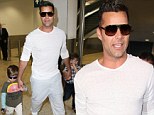 Daddy down under! Ricky Martin leads the way as he takes children for walkabout in Australian airport