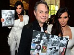 Collage of Kim: Pregnant Kim is presented with a framed collection of photos from her recent DuJour magazine shoot 