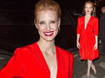 A Chastain classic: Jessica makes sure all eyes are on her at Paris Fashion Week in plunging red dress 