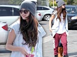 Dressed down Selena Gomez puts a freeze on the glamour as she enjoys fro-yo with pal after stunning desert video shoot 