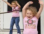 Going round in circles! Honey Boo Boo energetically shows off her hula hooping skills on her front porch