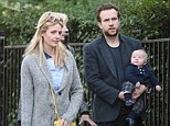 Family unit: Rafe Spall was joined by wife Elize Du Toit and son Rex on a stroll in London