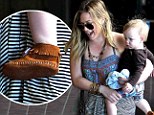 Hilary Duff's little man Luca follows in mommy's fashionable footsteps as he slips on a pair of trendy fringed moccasins