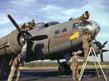 Getting ready: Members of the flight and ground crews of a B-17 bomber named 'Honey Chile II' make adjustments to their plane prior to a mission, Polebrook, Northamptonshire, England, fall 1942