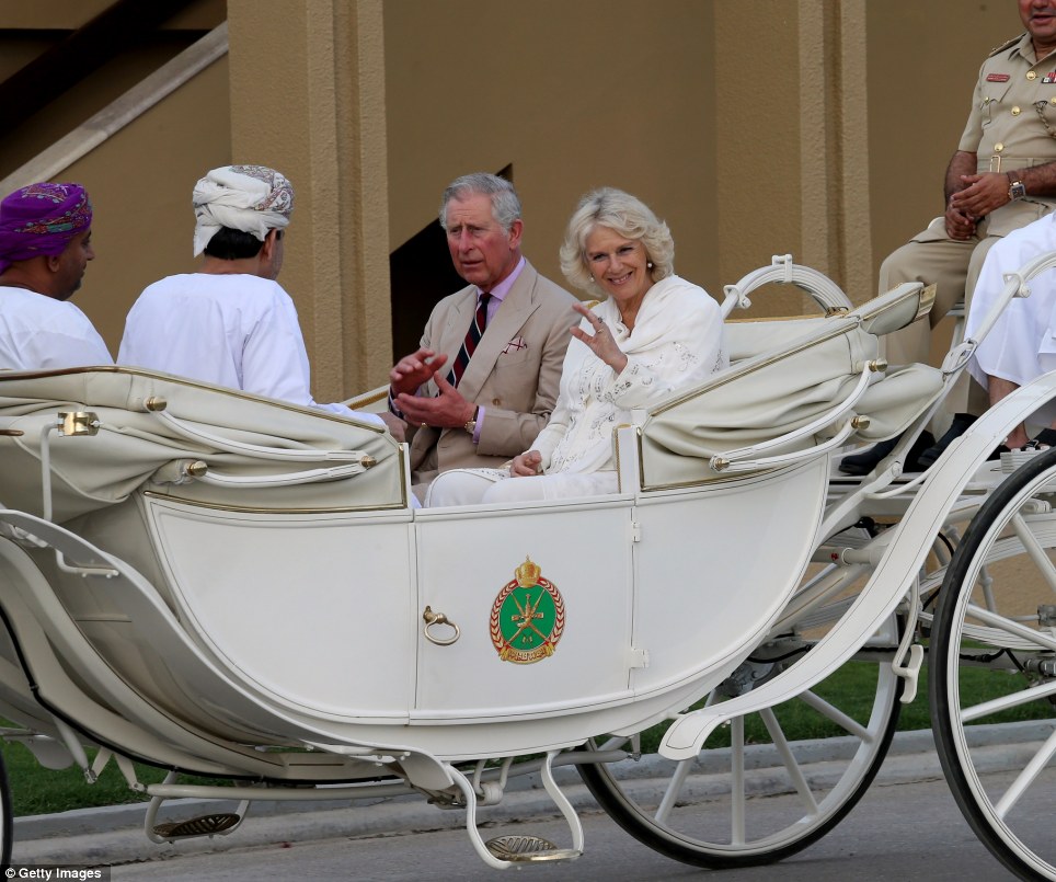 Royal greeting: Prince Charles, Prince of Wales and Camilla, Duchess of Cornwall arrive at a cavalry event on the eighth day of a tour of the Middle East in Muscat, Oman