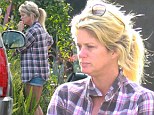 Even models have down days: Rachel Hunter shows off her natural beauty in shirt, shorts and messy hair