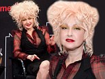 Those really are some True Colours! Cyndi Lauper bright yellow eyeshadow clashes with her hair-raising pink tinged tresses 
