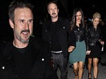 Three's not a crowd! David Arquette clutches onto girlfriend Christina McLarty's hand as they head home after a night of clubbing with blonde pal 