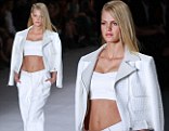 Abs-olutely fabulous! Erin Heatherton shows off her taut stomach and enviable curves in a sexy white crop top