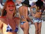 Candice Swanepoel dons a tie-dye bikini on Miami Bach, Florida