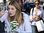 Mischa Barton chats with friends between mouthfuls over lunch in Beverly Hills