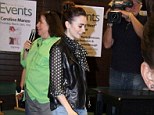 A lovely leading lady! Supportive star Lily Collins lends a helping hand to the author of upcoming novel-turned-movie