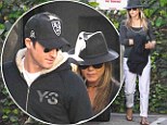 Feathering the nest! Jennifer Aniston plays mix and match in fedora and flip flops while antique shopping with Justin Theroux