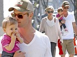 Chris Hemsworth and his wife Elsa Pataky make a quick run for a coffee and a bottle of water with their daughter India Rose Hemsworth in Venice Beach, California