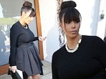 Where's the baby bump? Pregnant Kim Kardashian headed to a meeting in Beverly Hills, California on Wednesday