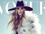 Mesmerizing: Rosie Huntington-Whiteley wears a rhinestone jumpsuit as she cover Vogue Brazil's April issue