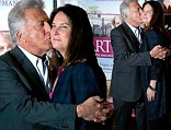More in love than ever! Dustin Hoffman showers his wife of 32 years with kisses at Paris premire